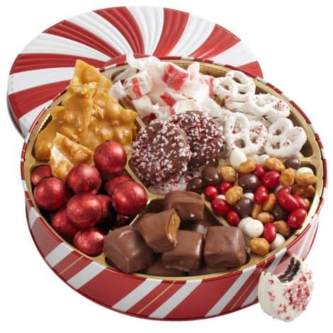 Christmas-themed gift basket with chocolates, nuts, and assorted treats. Perfect for birthdays, sympathy, get well wishes, for everyone!