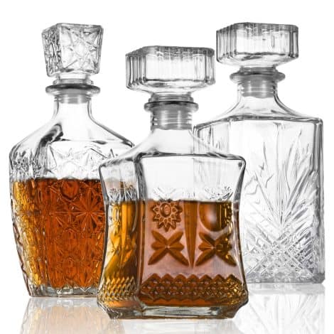 LAWADACH Glass Alcohol Bottle Set includes 3 unique decanters (28oz*2, 31oz*1) for whiskey, tequila, brandy, and vodka. Perfect for bar or party decorations.